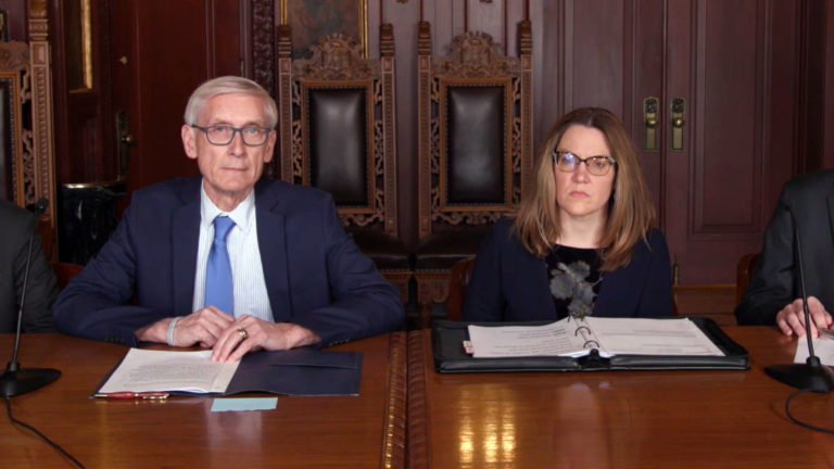 Gov. Tony Evers and Sec.-des. Andrea Palm Gov. Tony Evers and Sec.-des. Andrea Palm