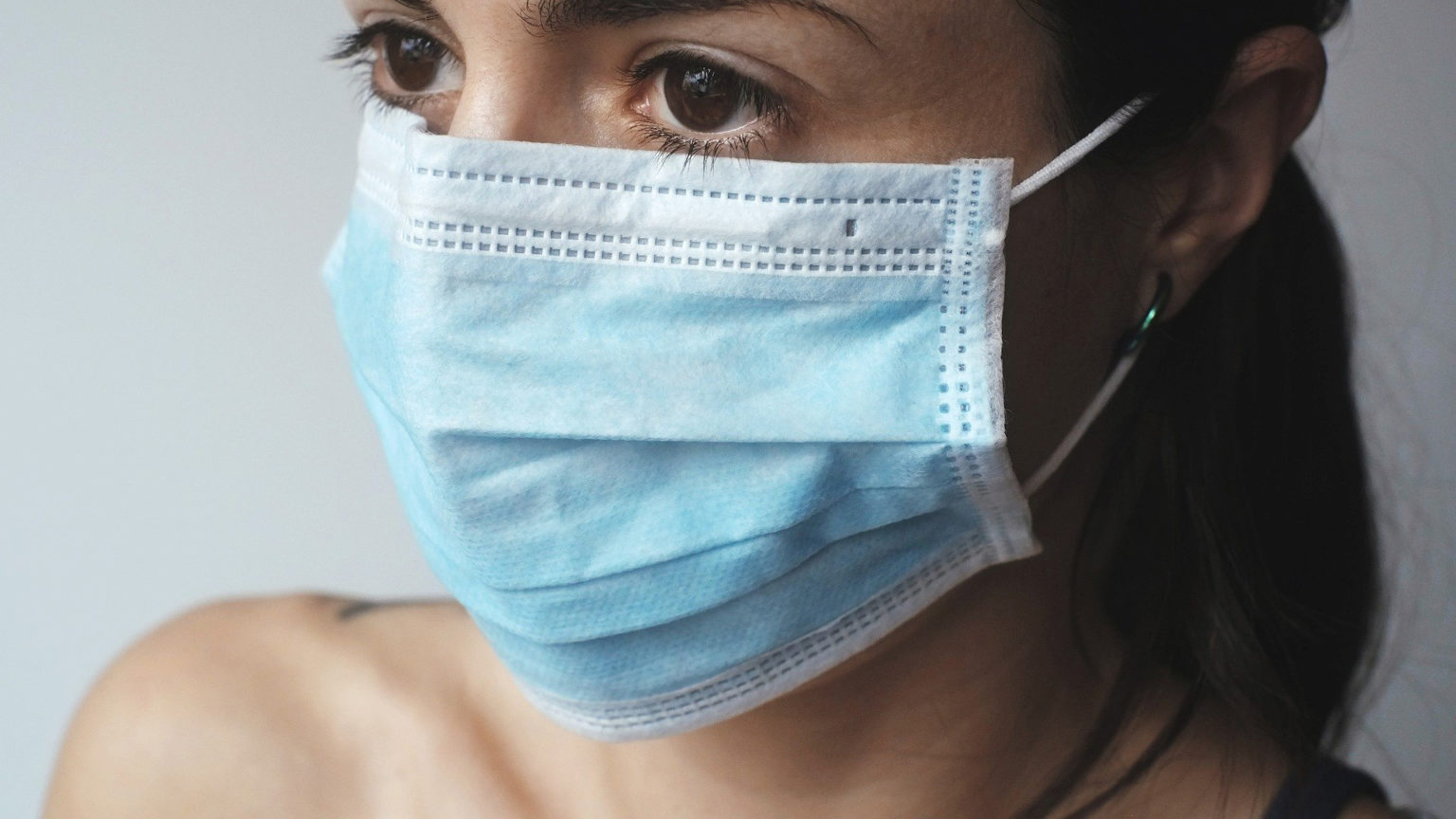 woman in protective hospital mask