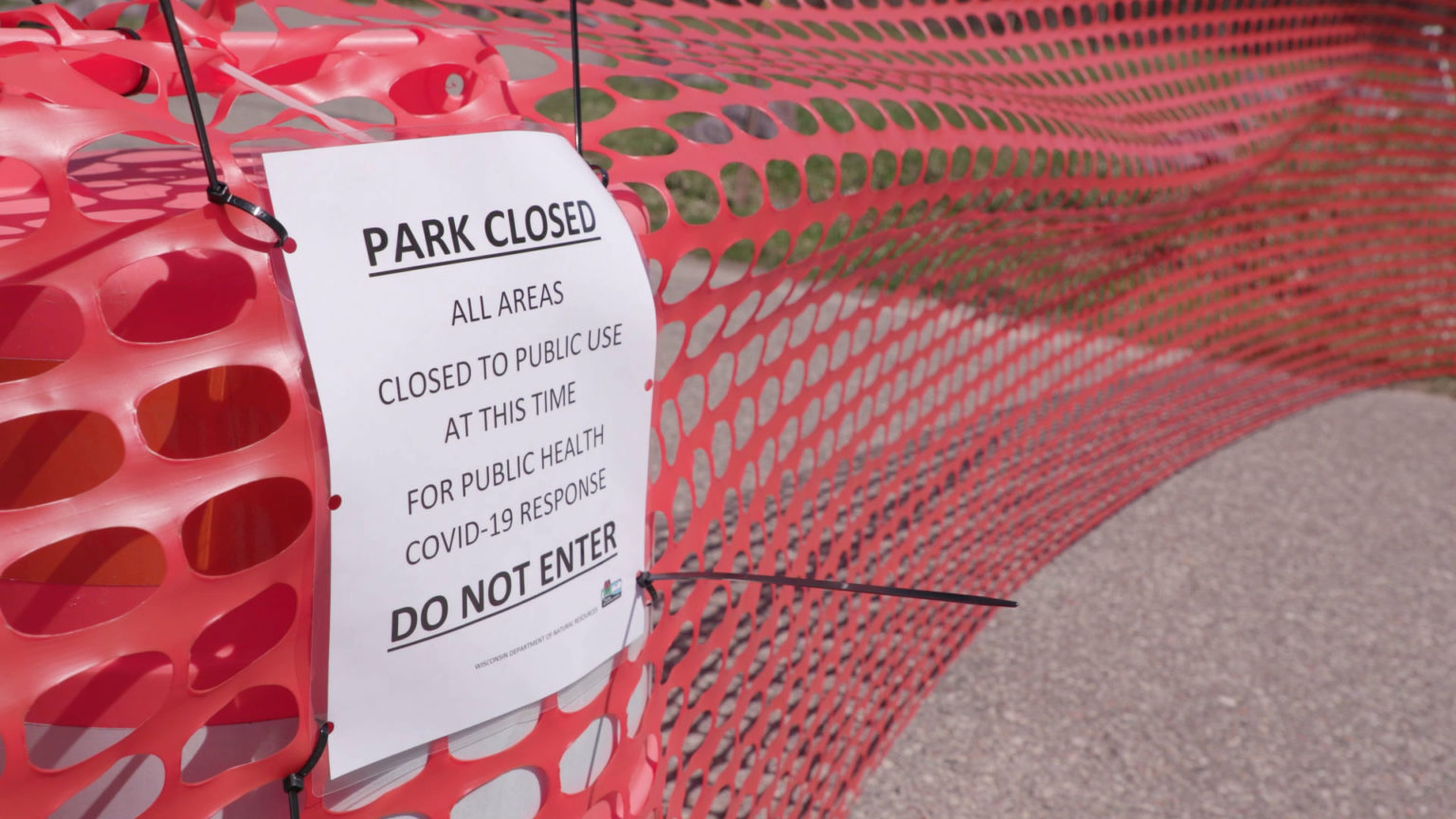 A sign showing state parks closed due to the COVID-19 outbreak April 10, 2020. 