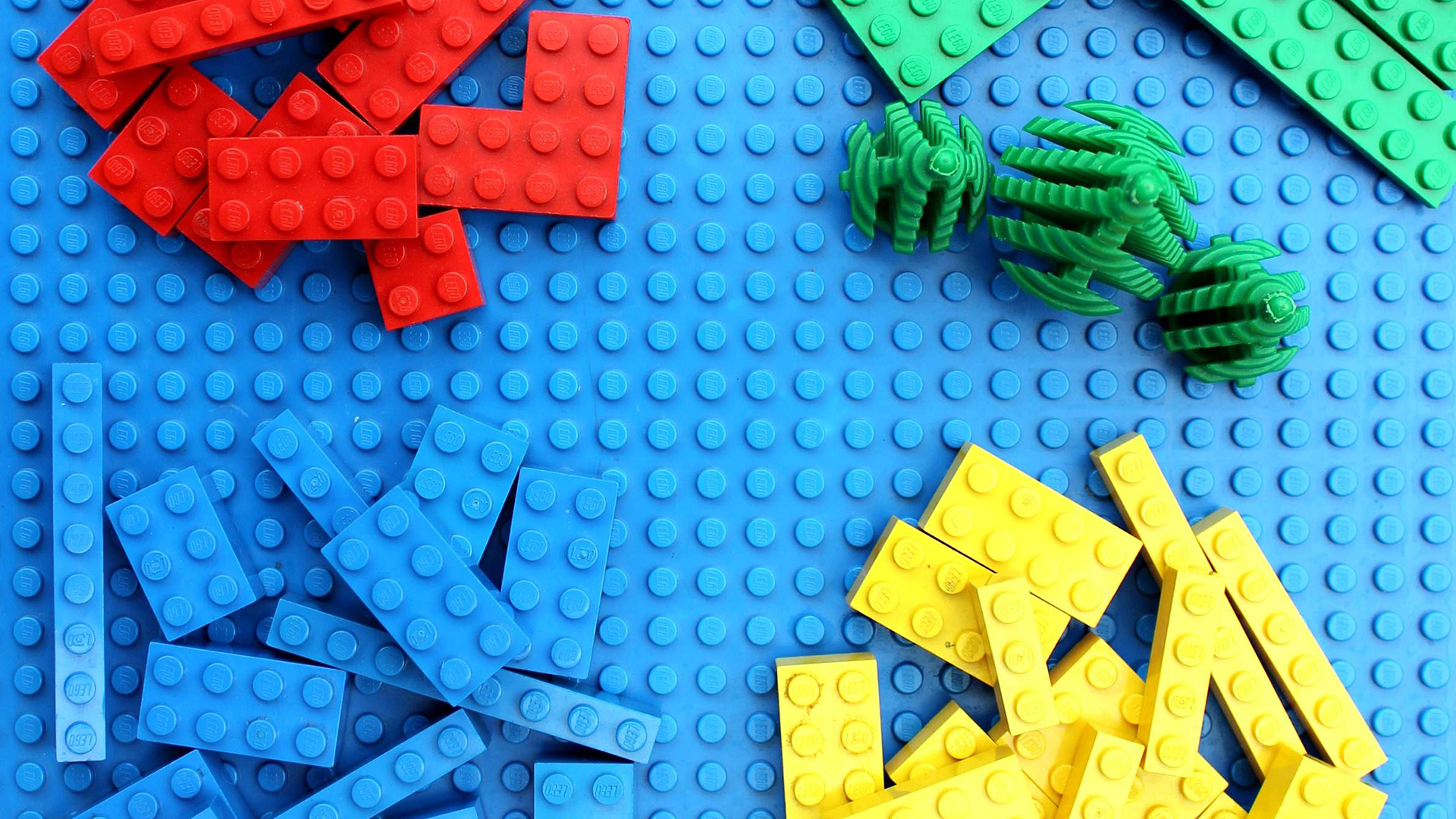 lego blocks stacked in piles by color