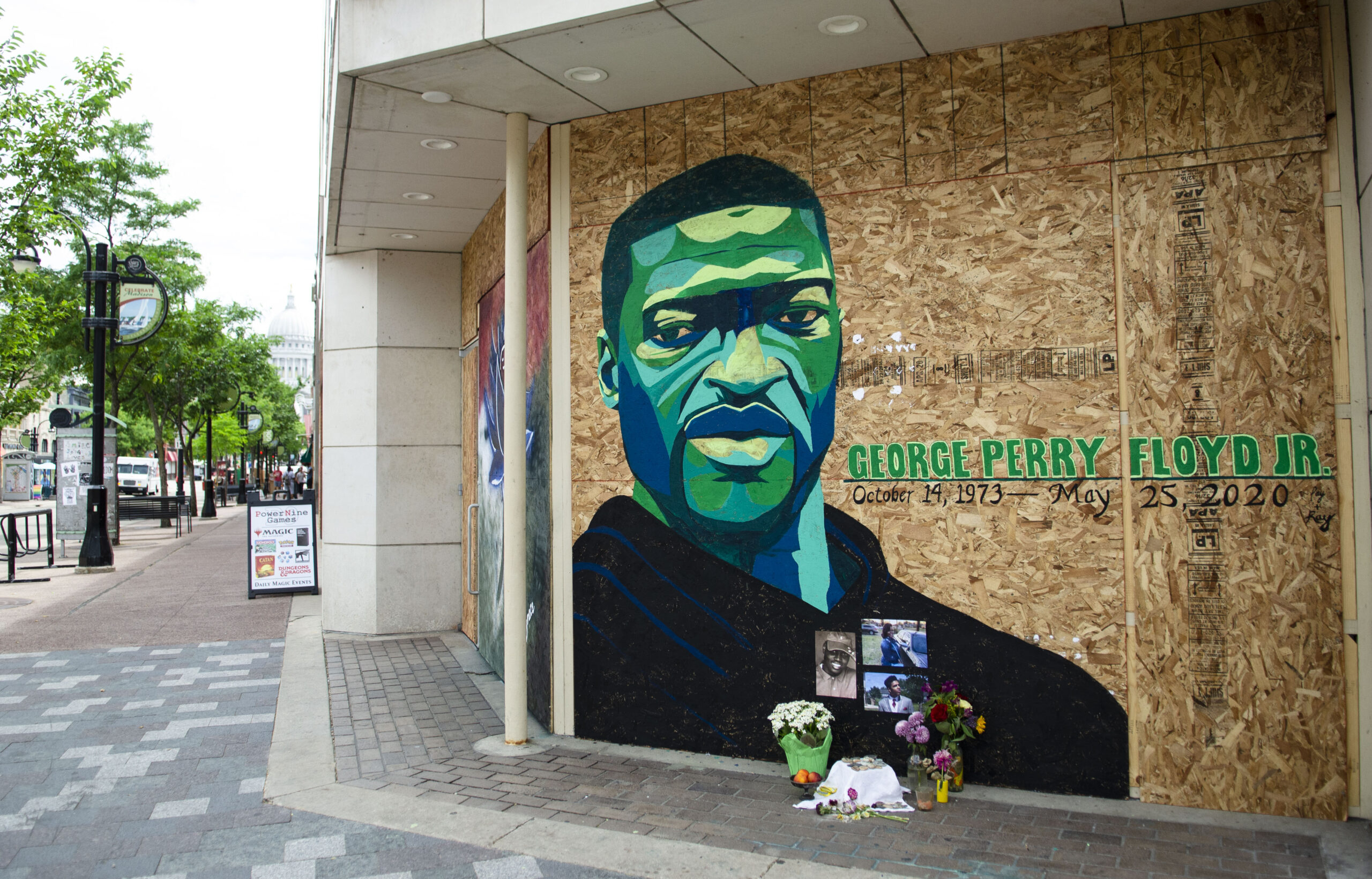 Photos: Boarded-up storefronts provide new canvas for graffiti in