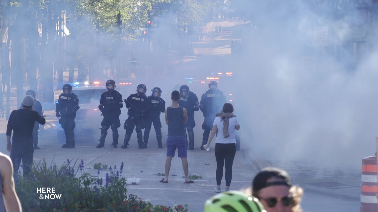 Protesters stand off against police on State Street in Madison's downtown May 30, 2020. 