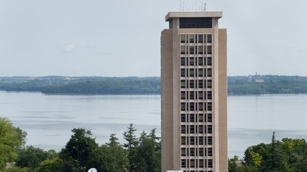 A profile of Van Hise Hall, home of the UW System administration, at the University of Wisconsin-Madison is pictured against a backdrop of Lake Mendota on June 10, 2010. (Courtesy: Jeff Miller / UW-Madison) 