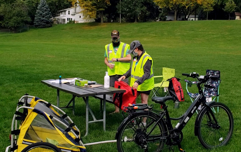 Poll workers in park