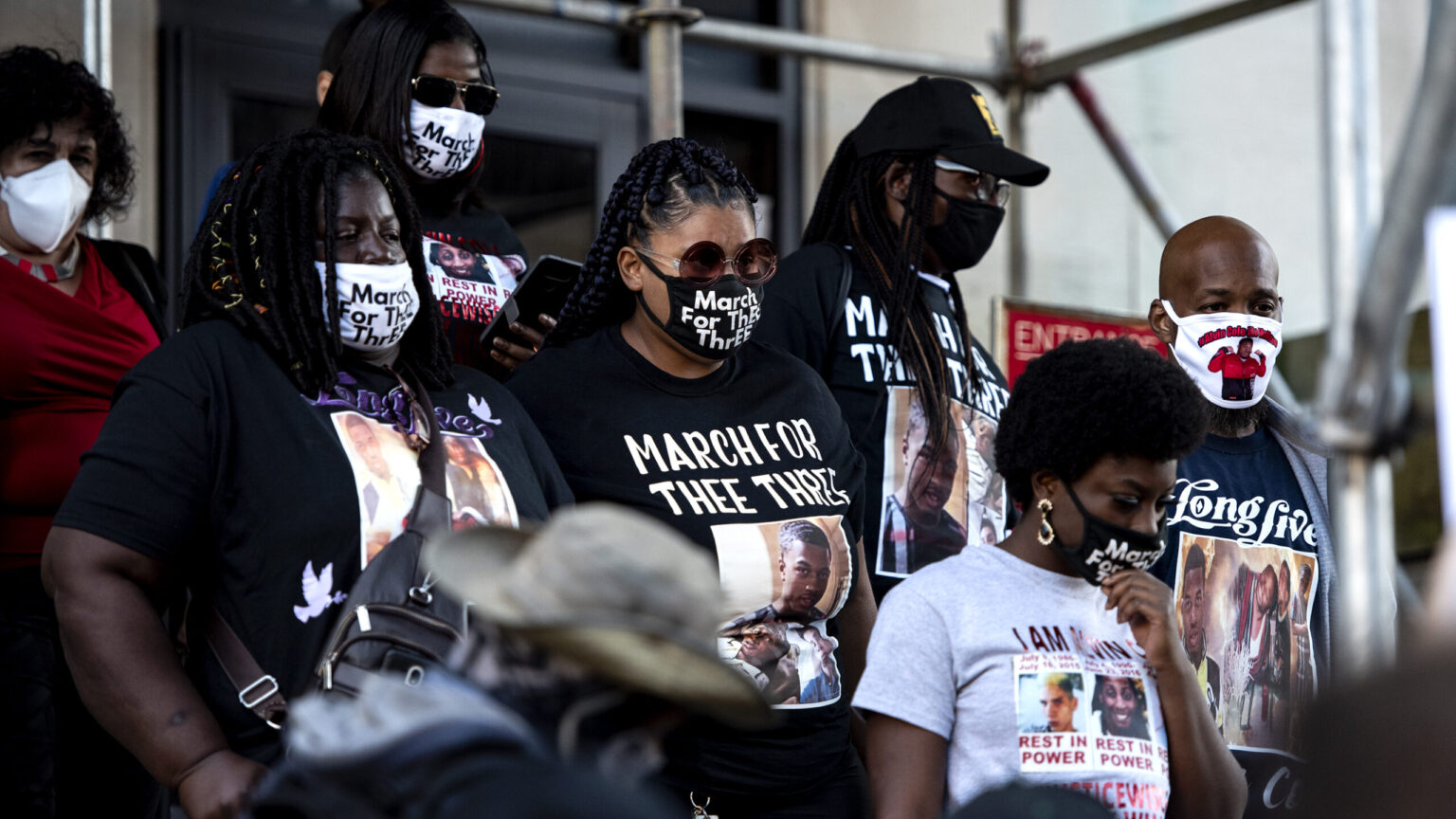 Alvin Cole’s family members walk down the stairs of the Milwaukee County Safety Building on Wednesday, Oct. 7, 2020. (Courtesy: Angela Major / WPR)