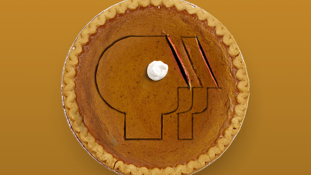 pumpkin pie with PBS logo cut into the top of it