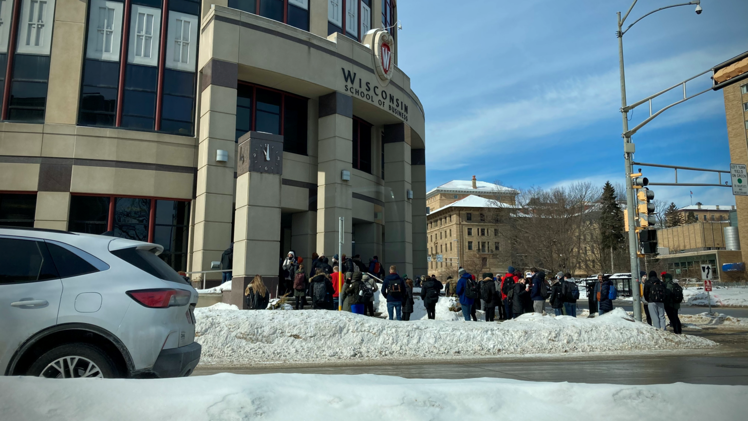 Students line up outside a UW-Madison building