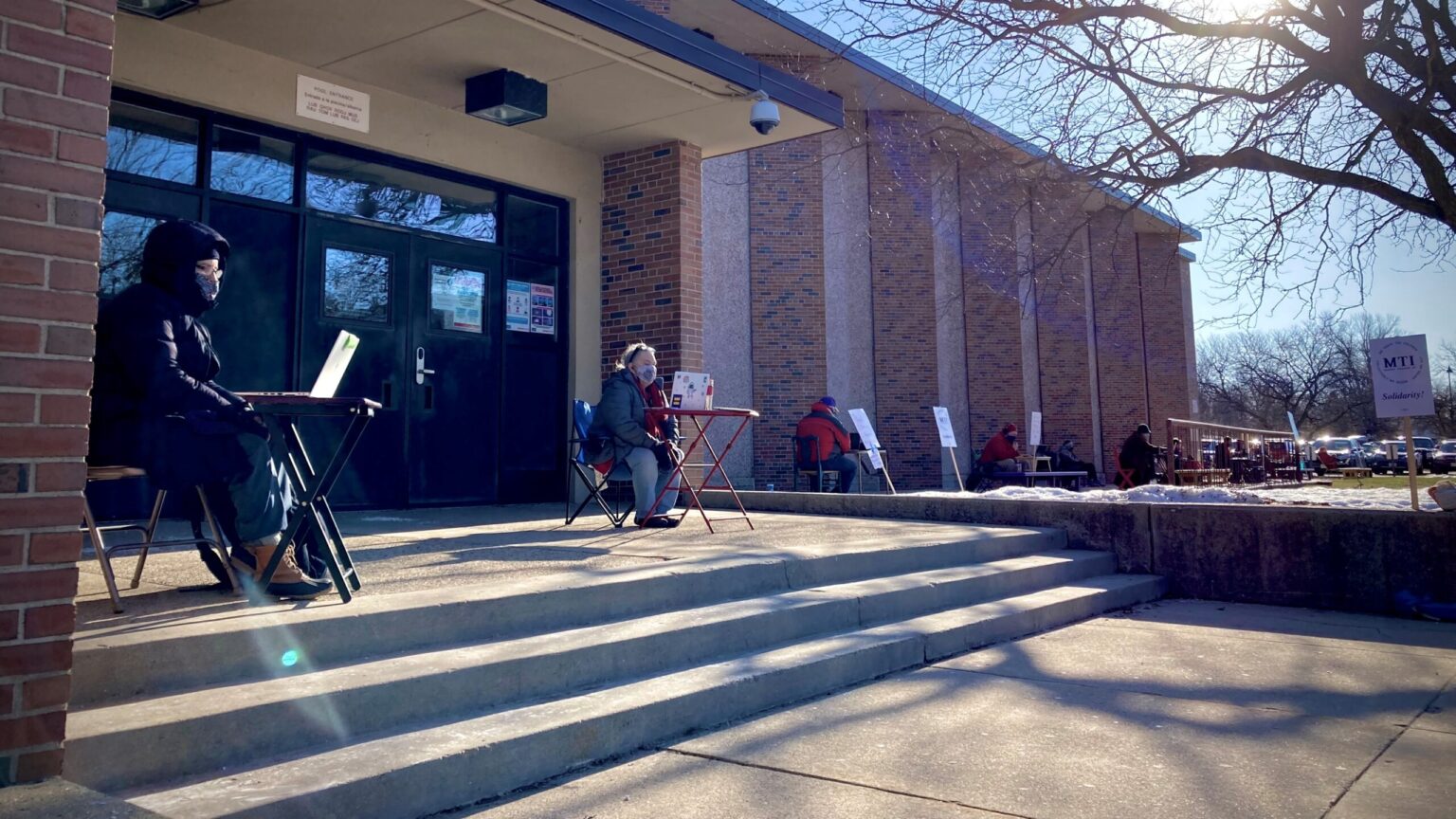 Teachers teaching outside in protest