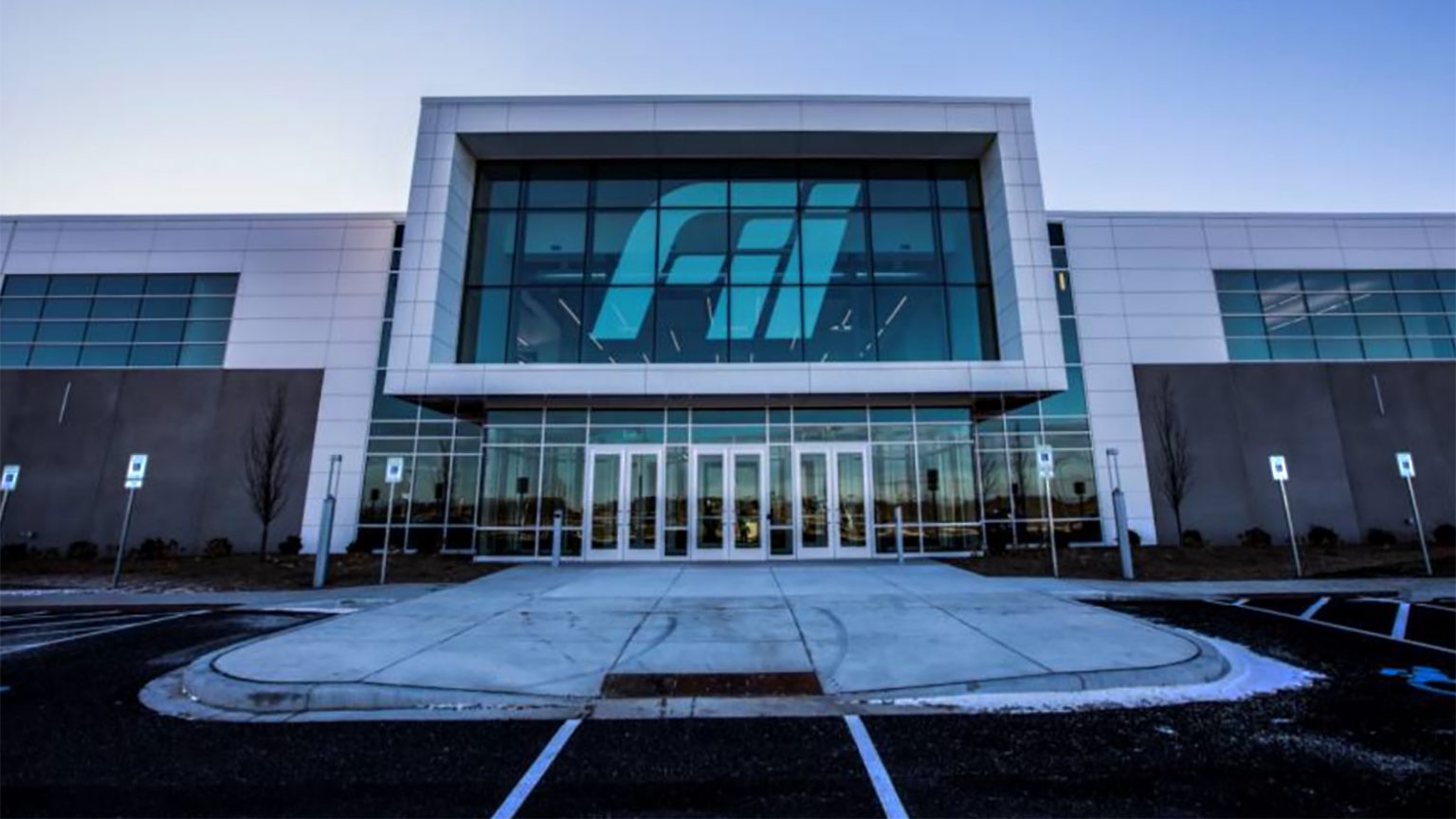 Front entrance doors and facade of Foxconn factory building in Mount Pleasant