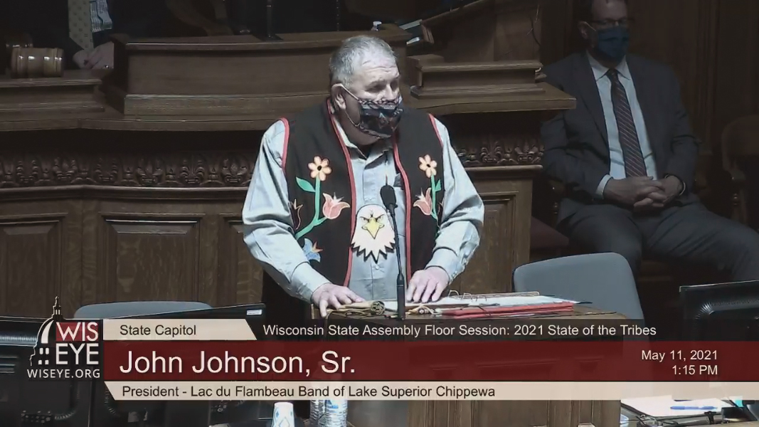 A screenshot of John Johnson, Sr. giving the 2021 State of the Tribes address in the Wisconsin Assembly chambers