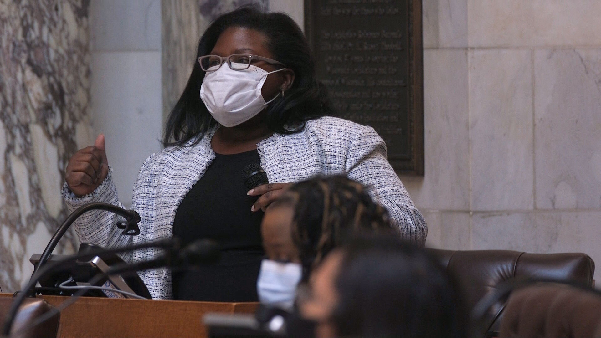 Rep. LaKeshia Myers stands and speaks in the Wisconsin Assembly chambers.