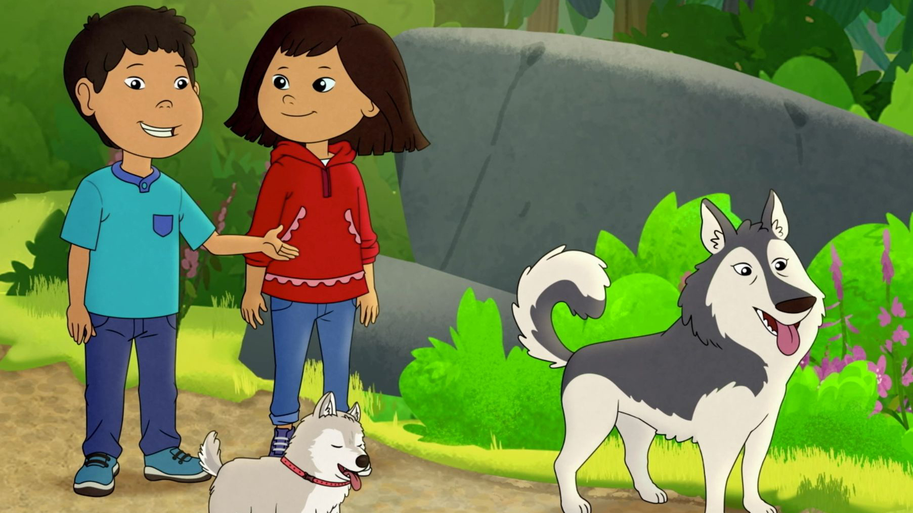Molly with boy and two dogs in forest