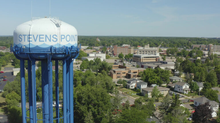 A water point labeled Stevens Point stands over buildings and trees.