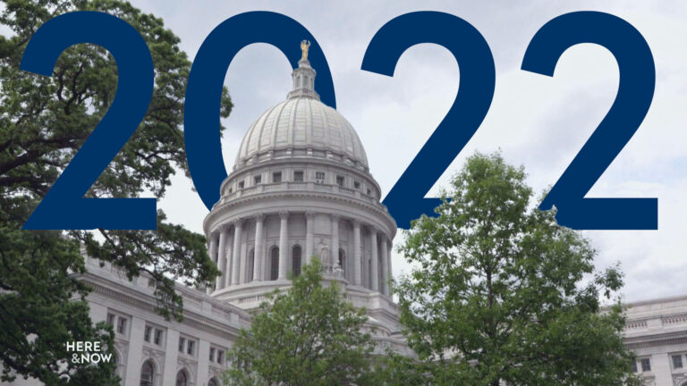 A photo collage features the Wisconsin building and dome and 2022 in blue numerals in the background.