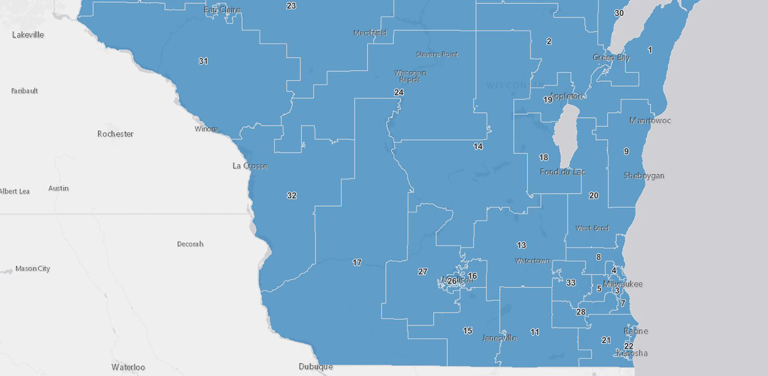 A map of Wisconsin shows numbered state Senate district boundaries in the southern half of the state.