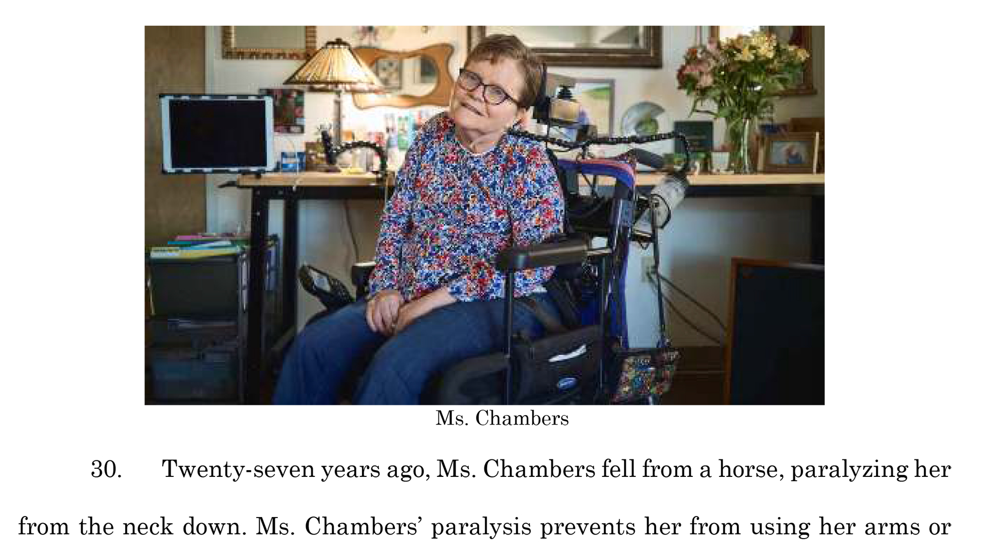 A screenshot from a lawsuit shows a photo of Martha Chambers with the caption "Ms. Chambers" and followed by a truncated line that reads, "30. Twenty-seven years ago, Ms. Chambers fell from a horse, paralyzing her from the next down. Ms. Chambers' paralysis prevents her from using her arms or..."