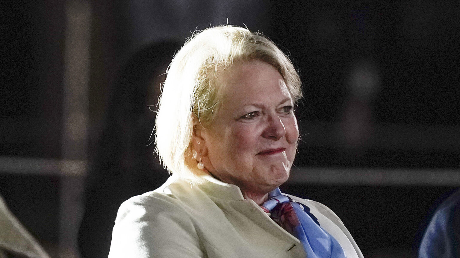 A close-up image shows Ginni Thomas seated.