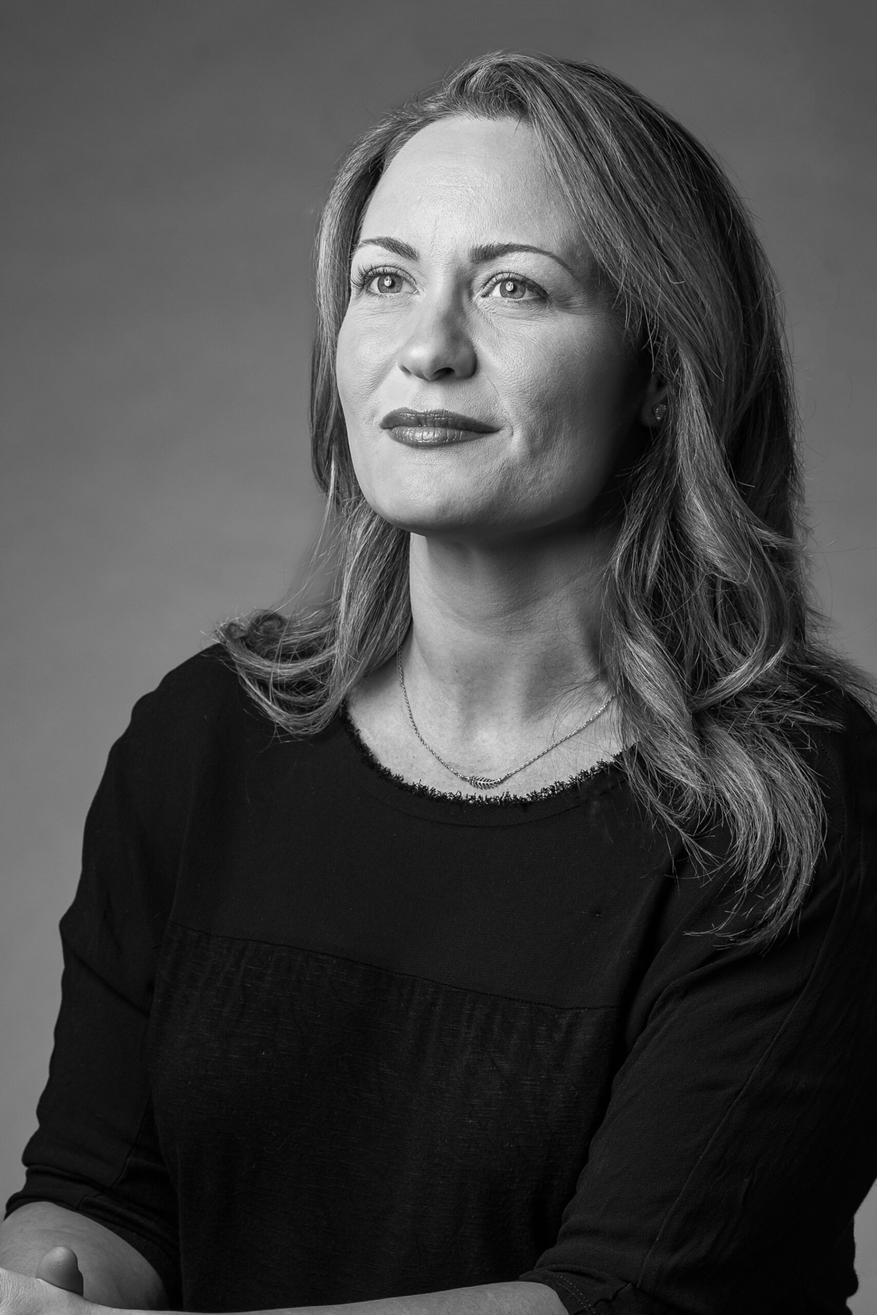 Black and white portrait of Managing Director of Legacy Giving, Aimee Granger