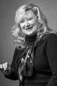 Black and white portrait of Director of Corporate Sponsorships, Julie Sternal