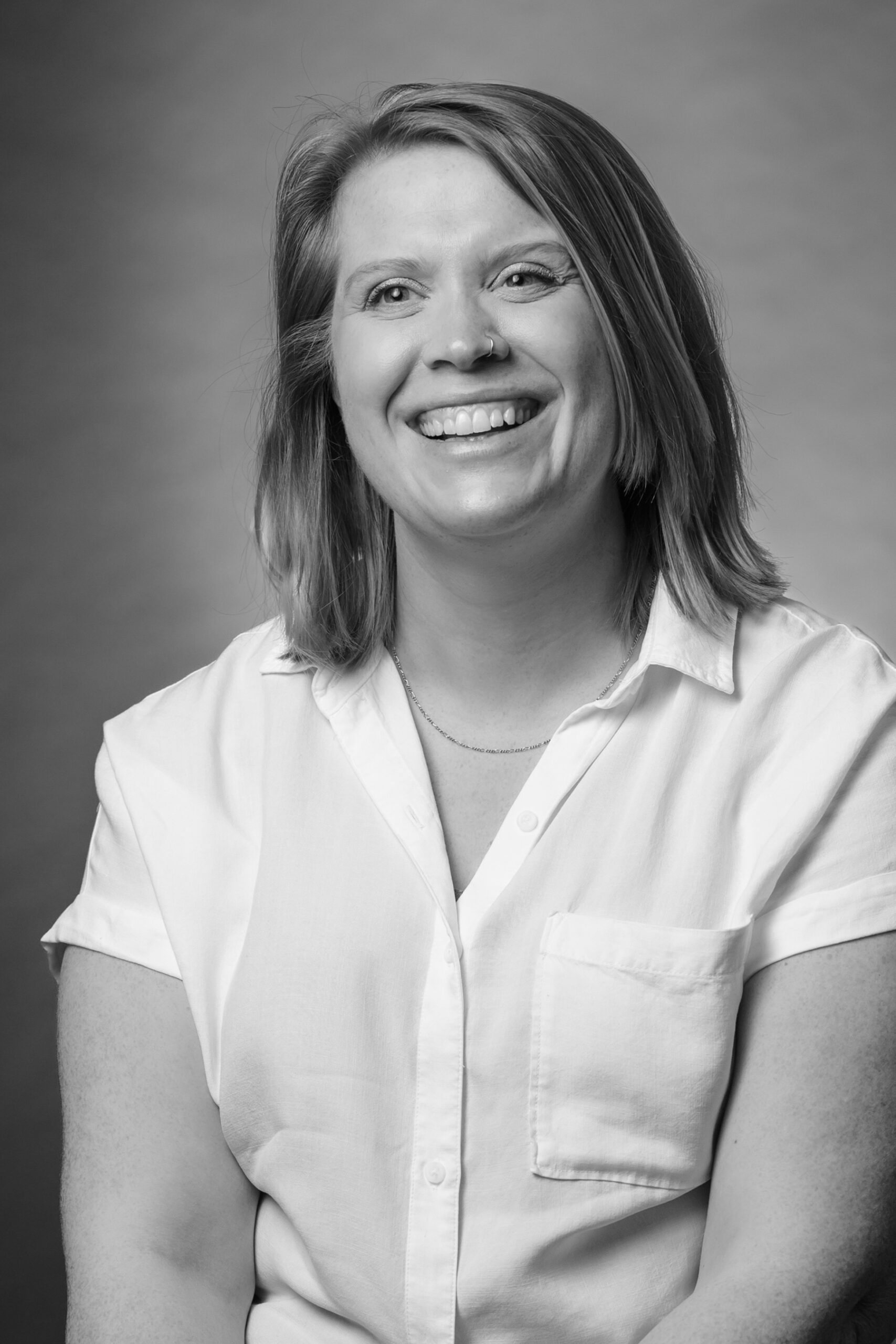 Black and white portrait of Membership Volunteer Manager, Katie Dreps
