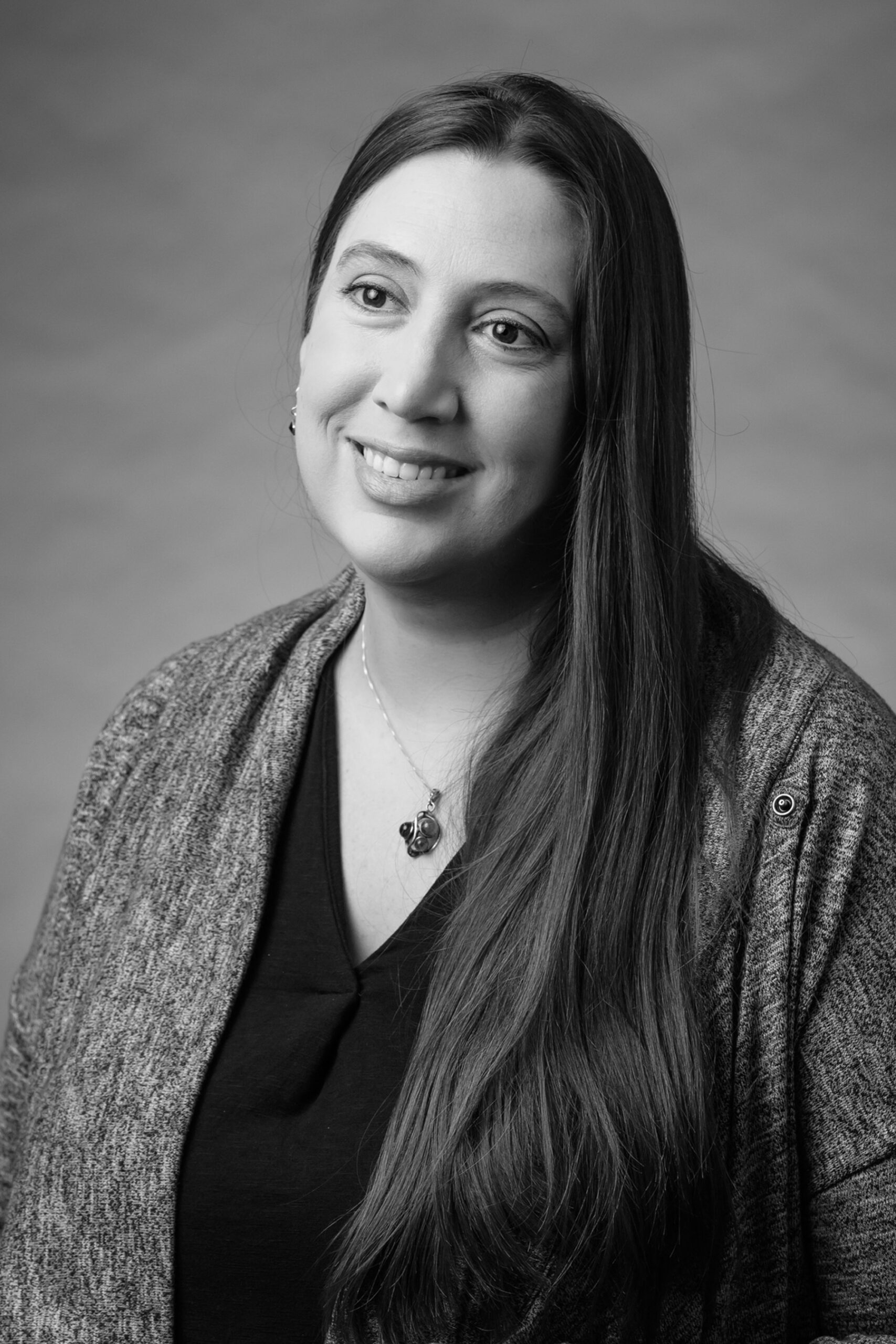 Black and white portrait of Audience Services Manager, Kayleigh Steinback