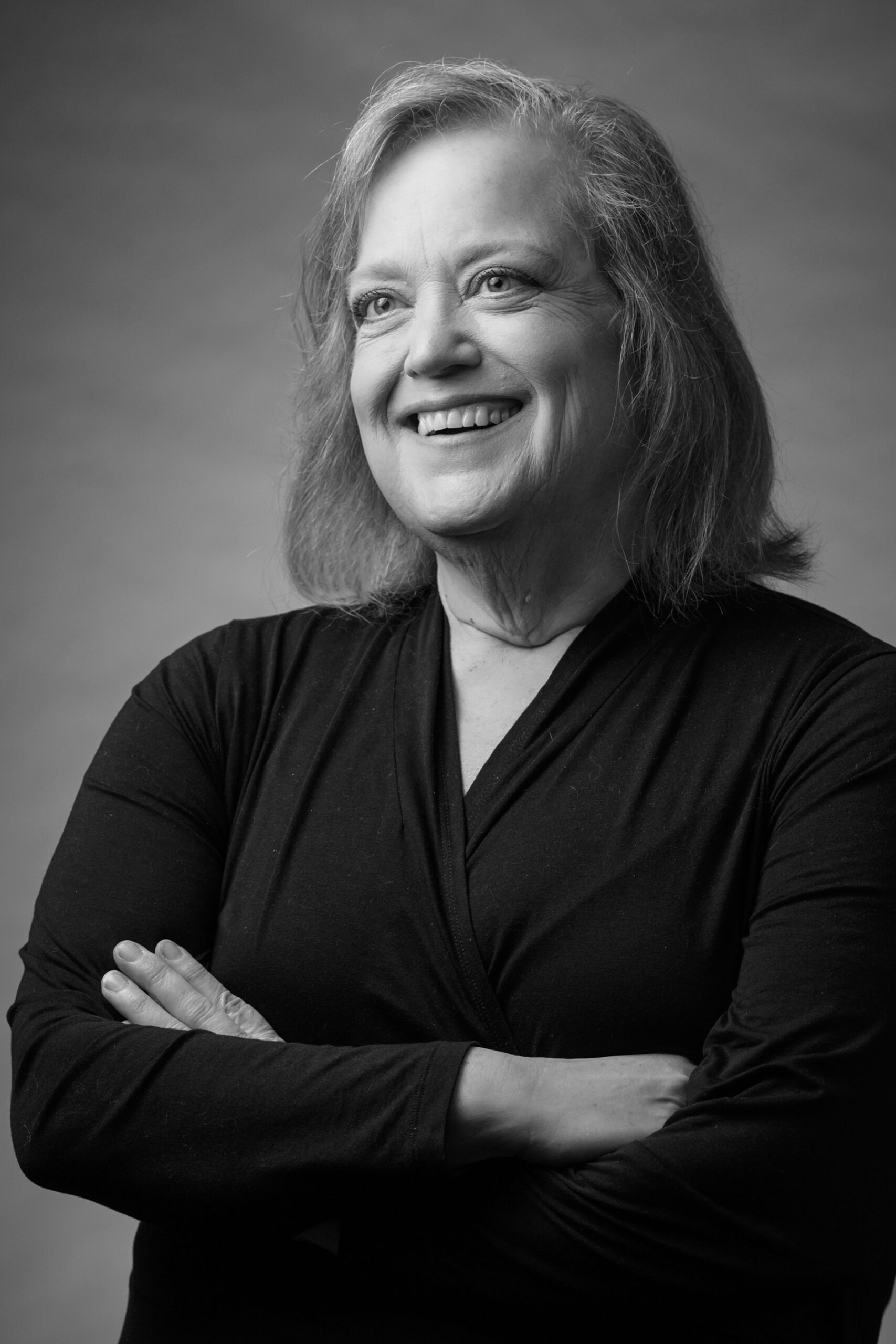 Black and white portrait of Director of Business Sponsorship, Lisa Fichter