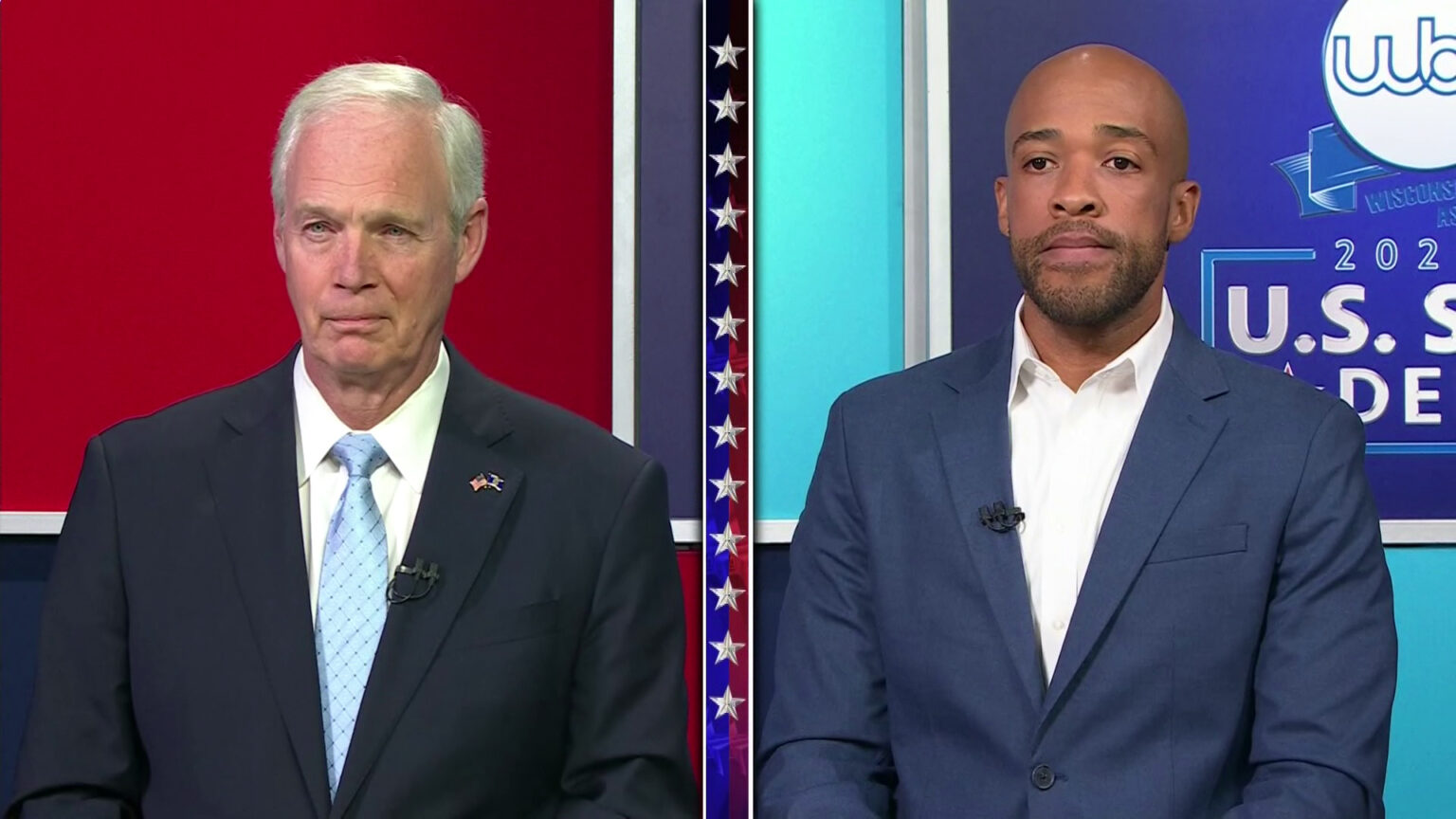 A split screen shows Ron Johnson and Mandela Barnes in different areas of a stage set.