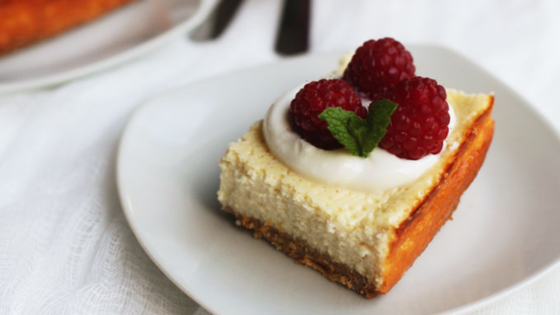 Cheesecake with raspberries on top