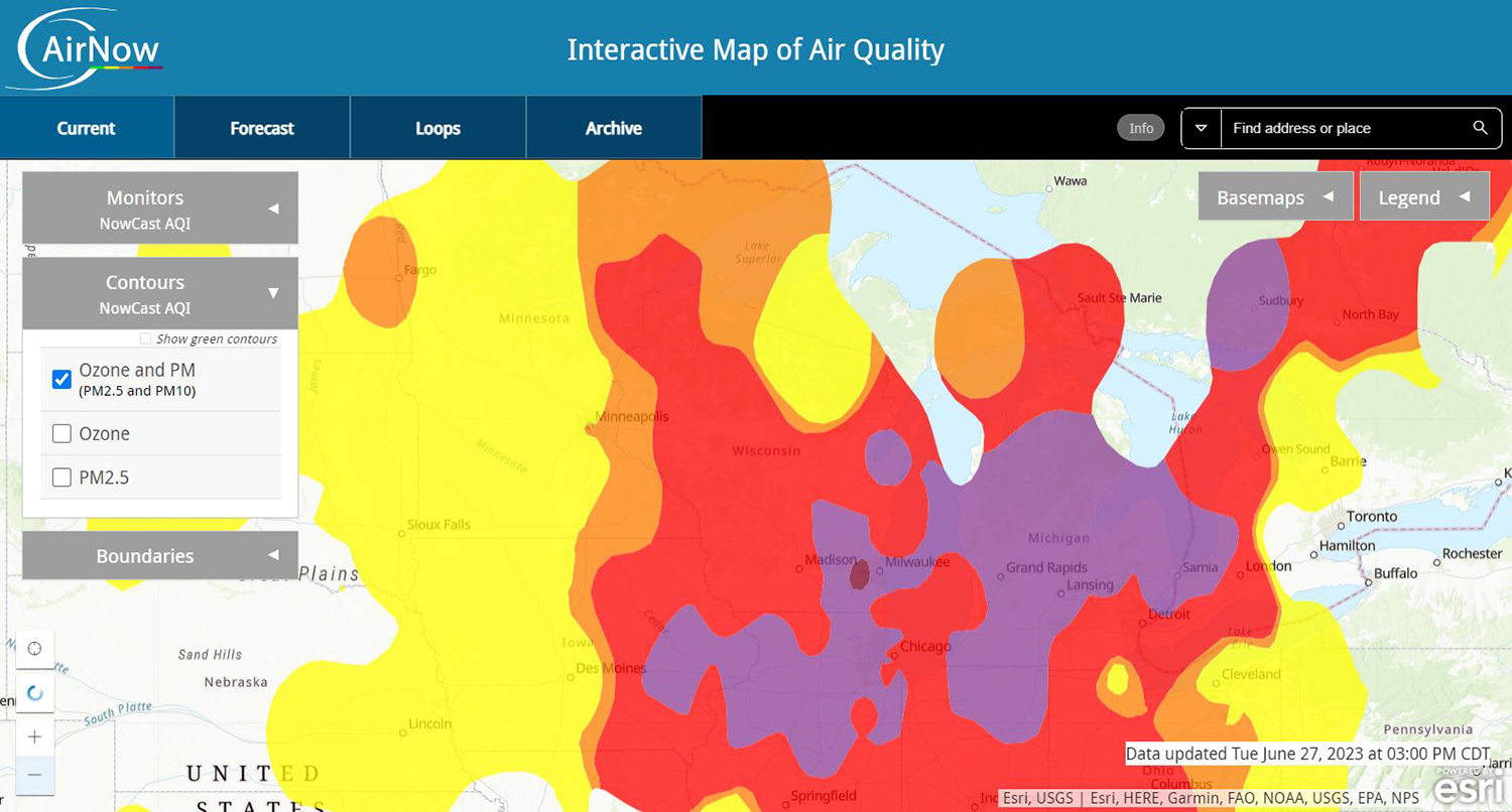 A screenshot from the U.S. Air Quality Index shows its "Interactive Map of Air Quality" for Wisconsin and surrounding areas, with different colors used to designate levels of air quality levels.
