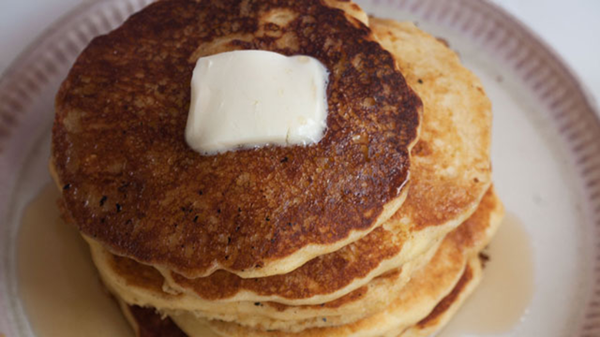 A stack of pancakes on a plate