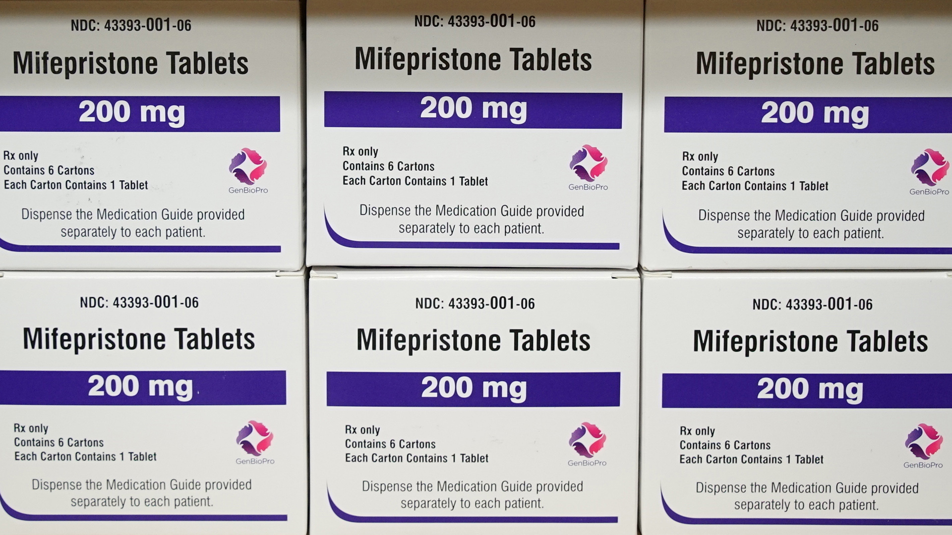 Six cardboard medication boxes with the labels "Mifepristone Tables" and "200 mg" are stacked in two rows of three.