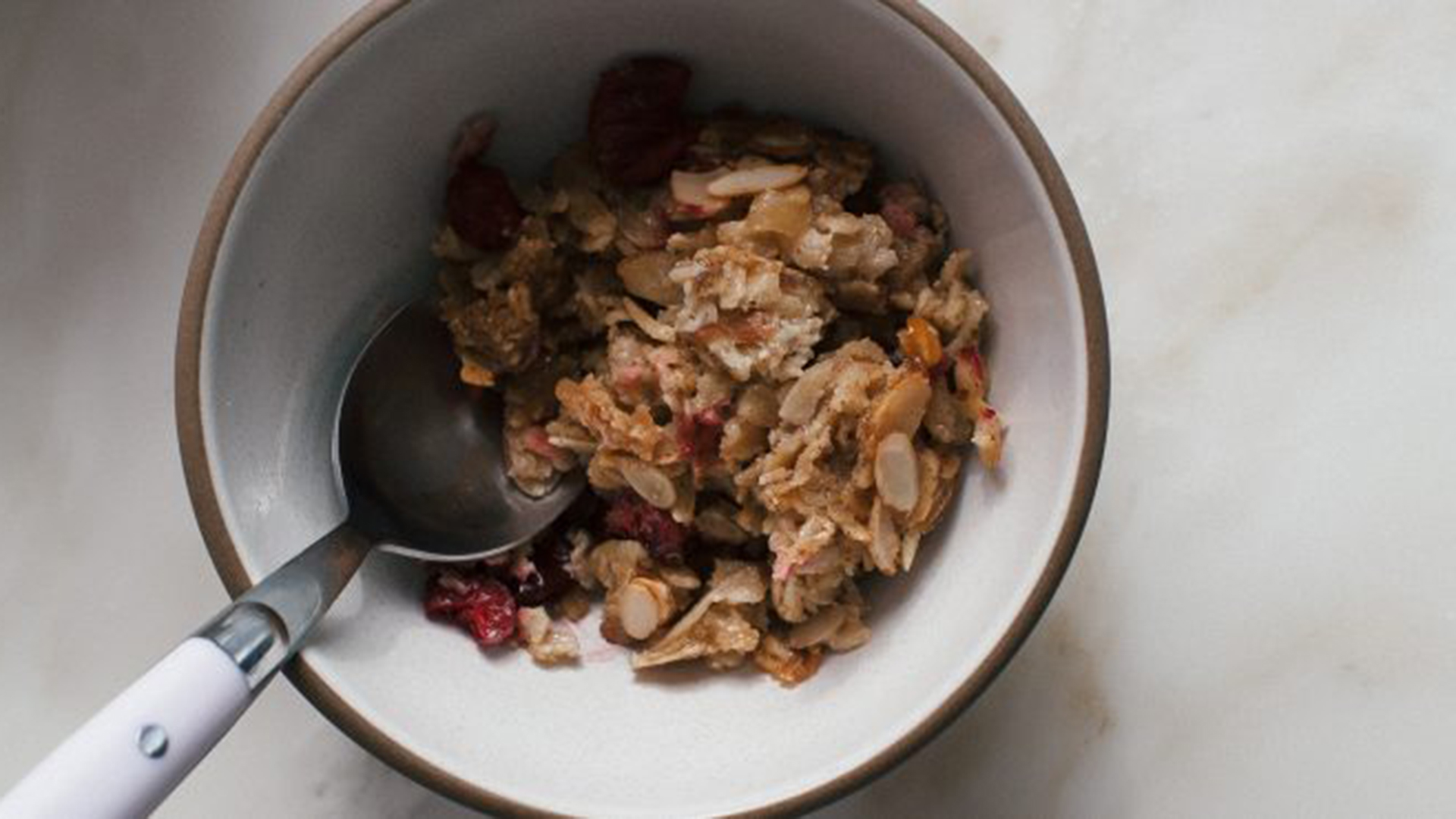 Bowl of oatmeal with spoon