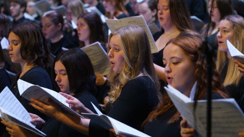 A section of women sing in the UW-Eau Claire choir.