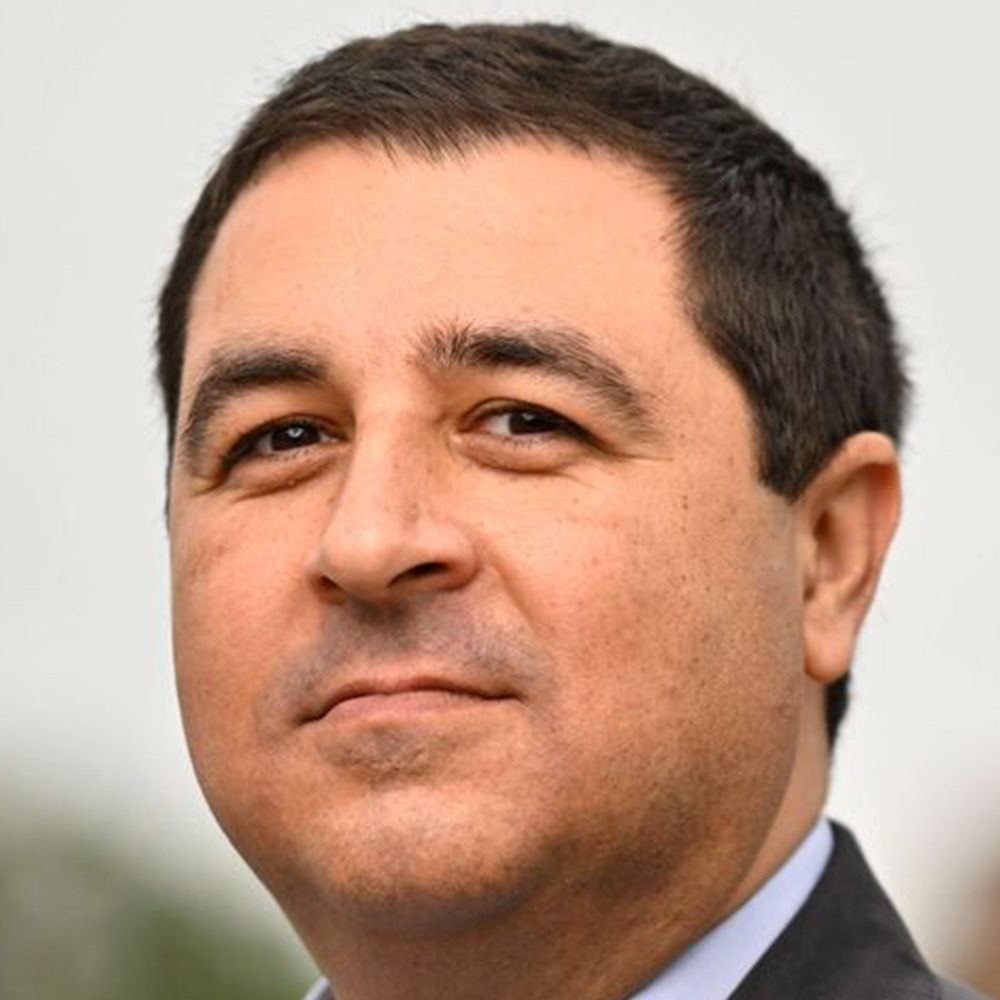 Josh Kaul poses for a portrait.