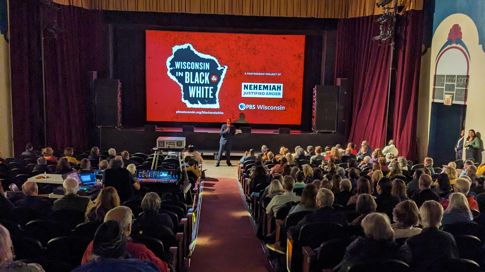 An audience watching a screening of Wisconsin in Black and White.