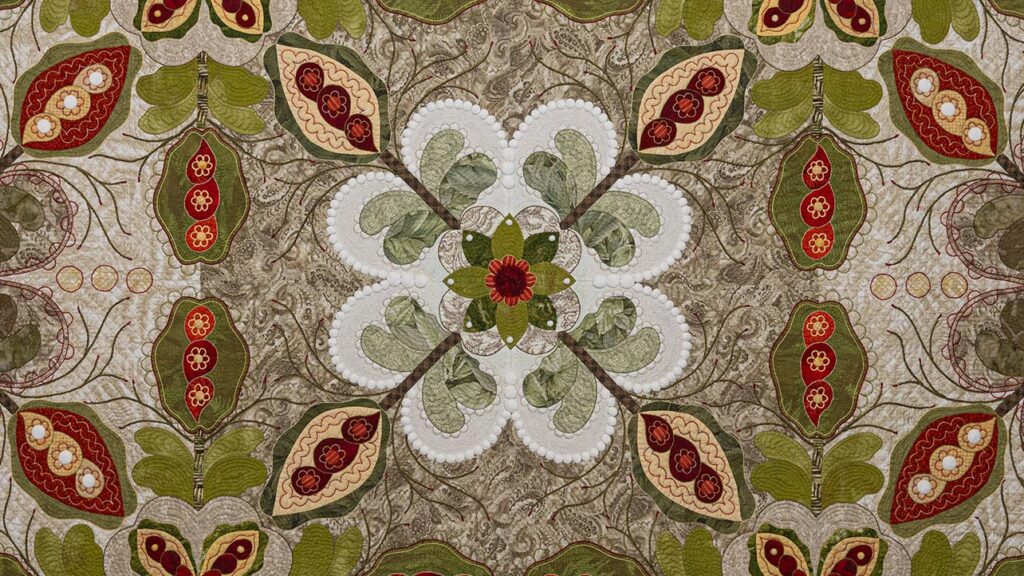 Middle of "The Crossing," a traditional, warm-toned quilt embellished with white circles throughout.