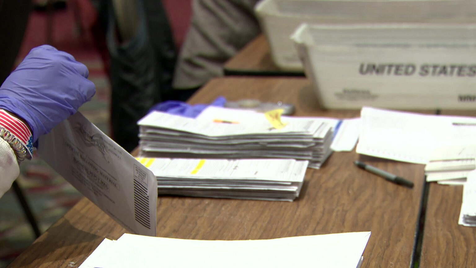 A poll worker at Milwaukee's central count location processes absentee ballots on Nov. 9, 2022. A Door County judge on July 29, 2024, dismissed a lawsuit challenged the state's absentee voting procedures. (Credit: PBS Wisconsin)