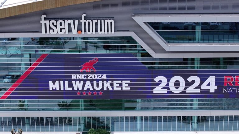 A banner on Fiserv Forum reads RNC 2024 Milwaukee
