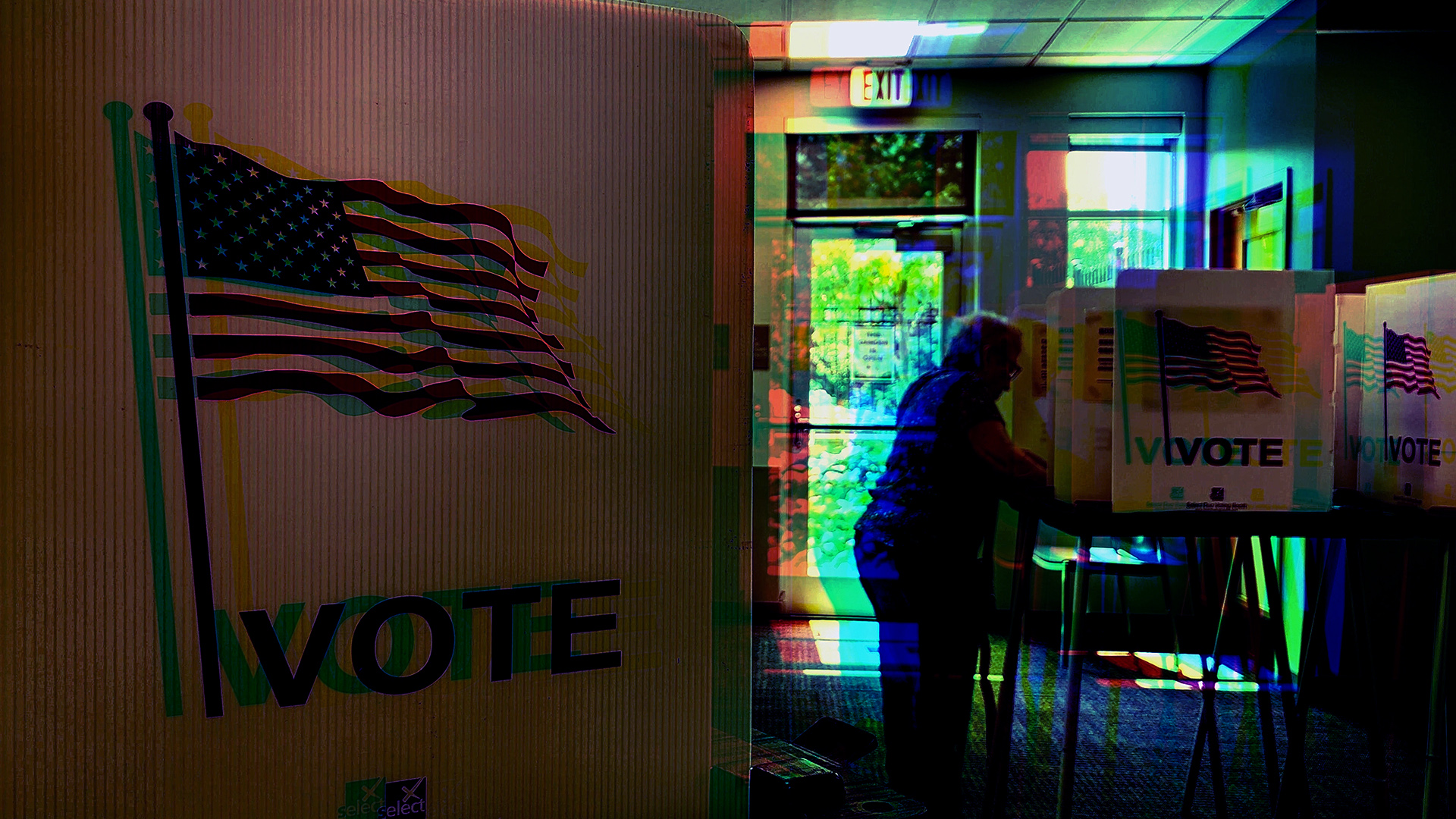 A photo illustration featuring 3-D style dual images in multiple colors shows a voter standing and facing one of several multiple temporary voting booths with cardboard privacy screens with an image of the U.S. flag and the word VOTE on the side mounted on a plastic table with metal legs, with the side of another voting booth in the foreground and a glass door with an "EXIT" sign above it in the background.