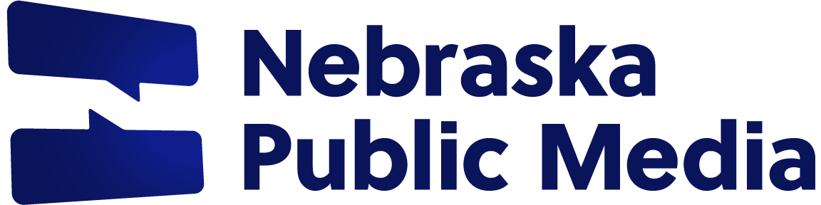 Nebraska Public Media logo with two stacked blue speech bubbles beside bold text reading ‘Nebraska Public Media’.