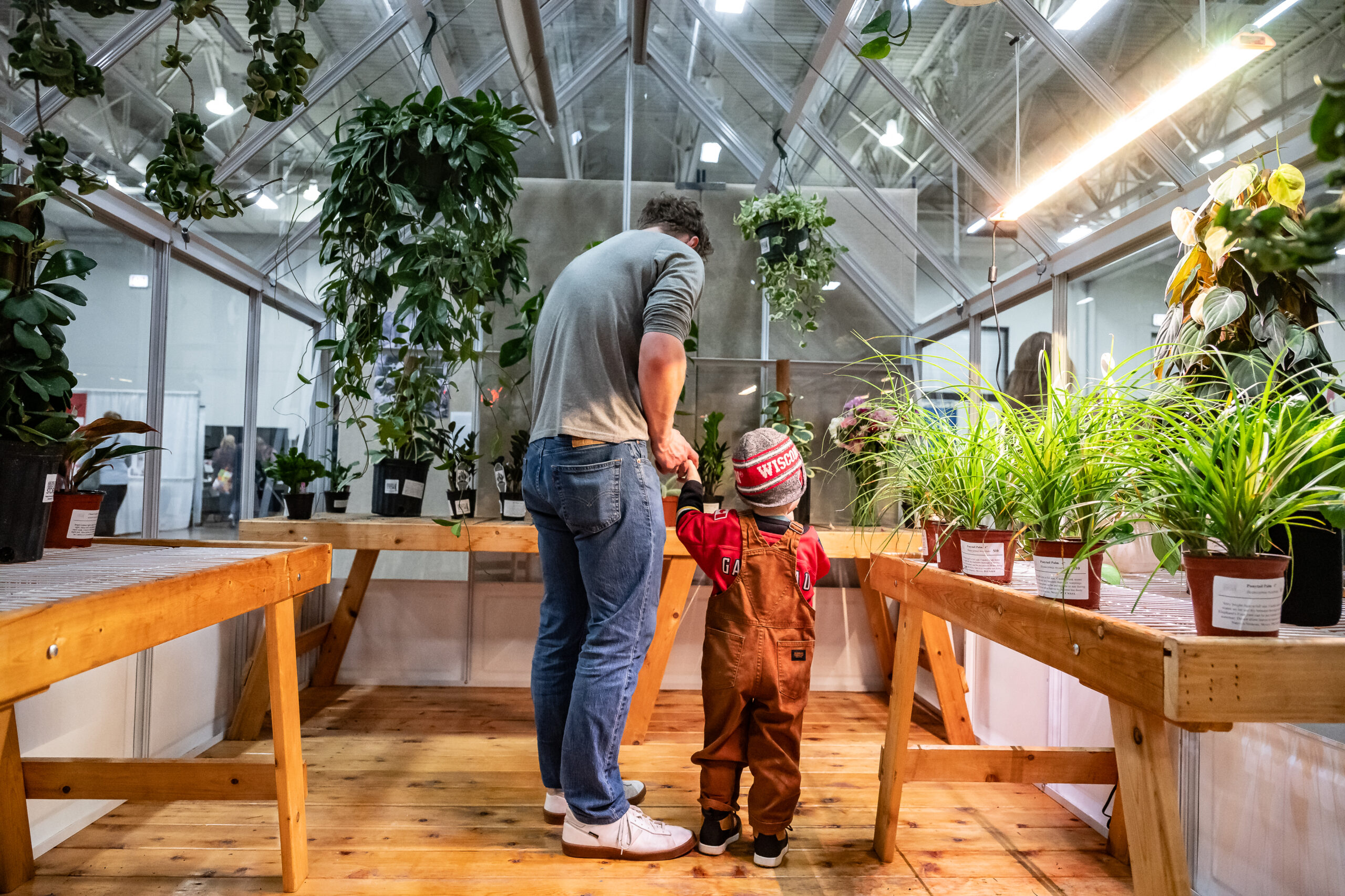 One big garden lover and one little garden enthusiast enjoying a booth at the 2025 Garden & Green Living Expo. (Source: PBS Wisconsin) One big garden lover and one little garden enthusiast enjoying a booth at the 2025 Garden & Green Living Expo. (Source: PBS Wisconsin)