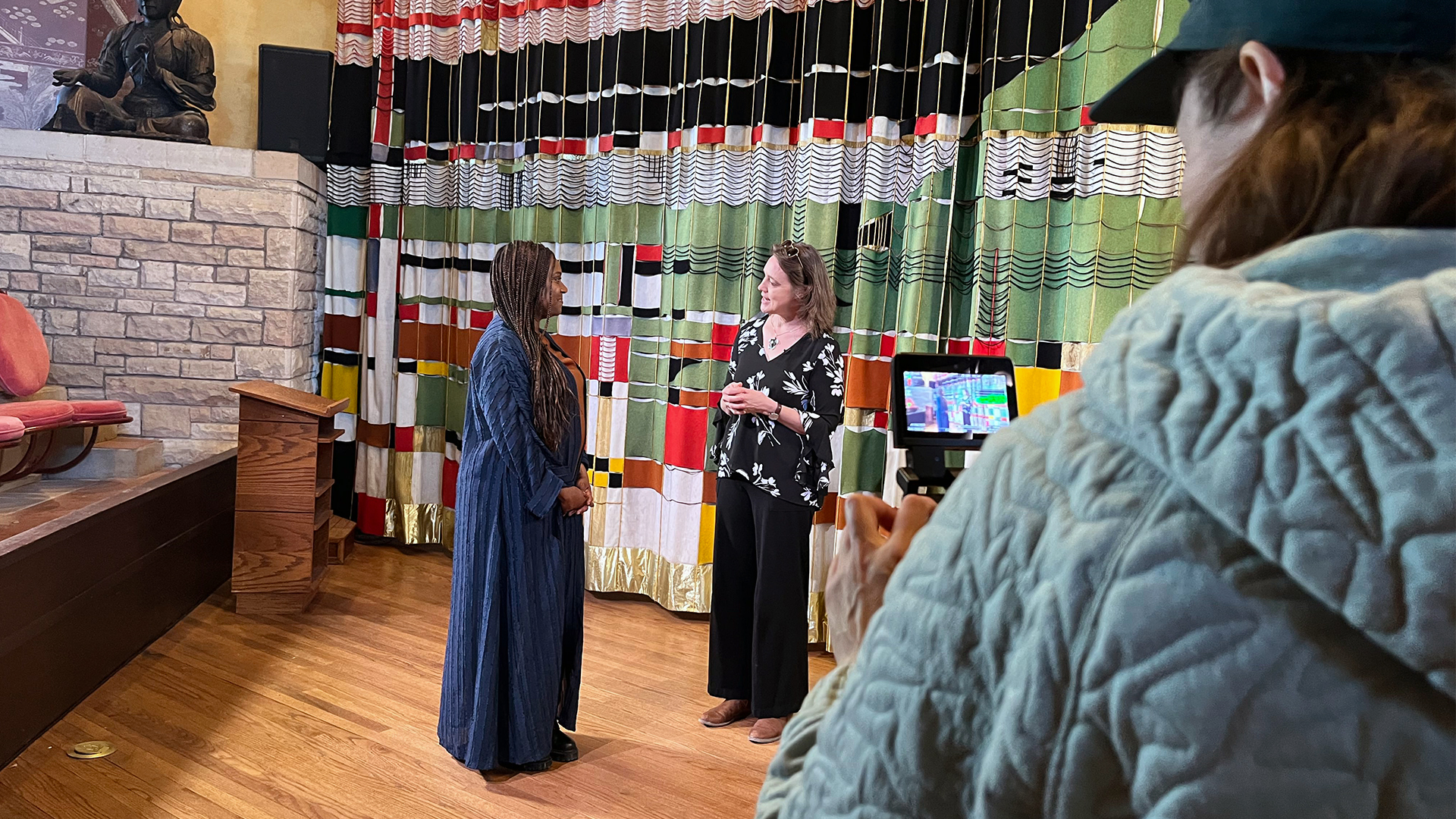 Two women - 'Wisconsin Life' host Angela Fitzgerald on the left - stand together at Frank Lloyd Wright's Taliesin in Spring Green, Wisconsin.