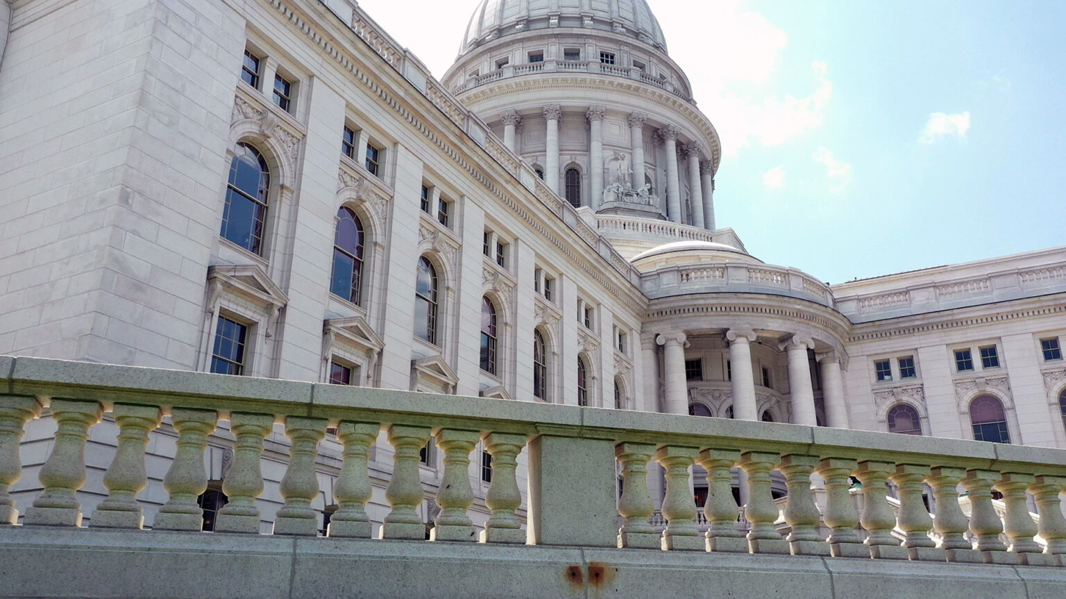 Sunlight illuminates clouds behind the dome of the Wisconsin State Capitol on June 22, 2023, in Madison. (Credit: PBS Wisconsin)