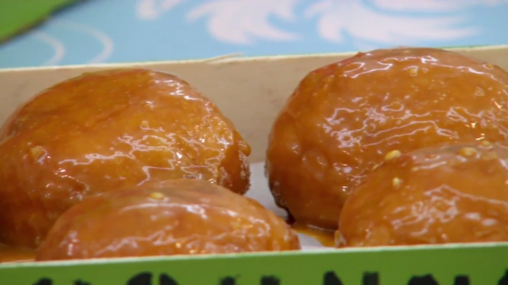 A close up of toffee apple doughnuts.