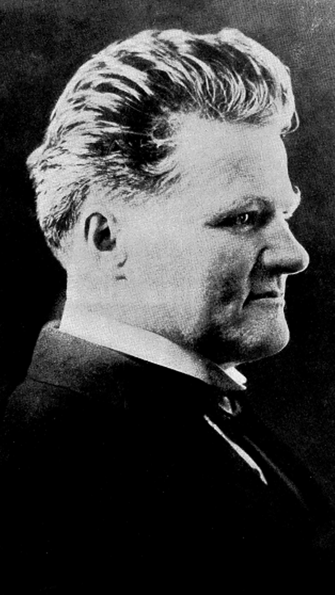 An archival grayscale portrait shows Henry Allen Huber in profile.