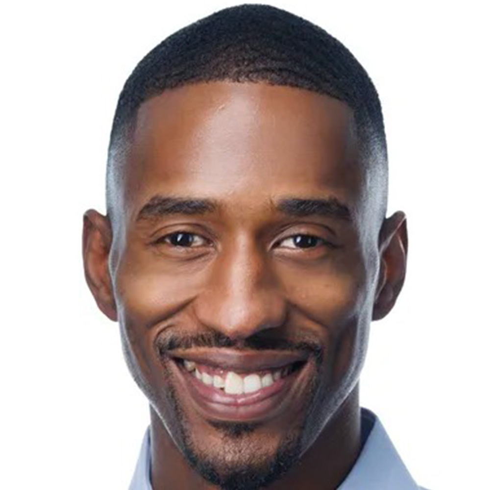 Carlos Dixon poses for a portrait.