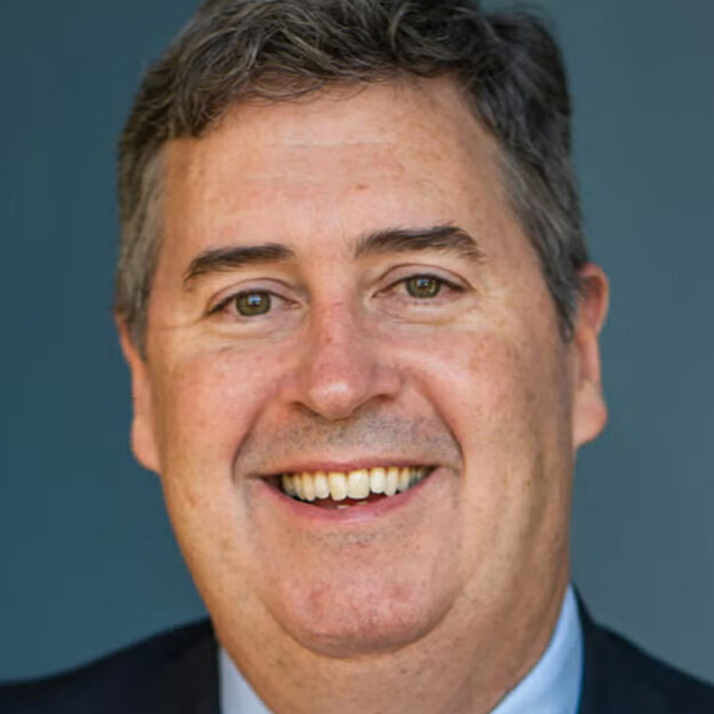 Joel Brennan poses for a portrait.