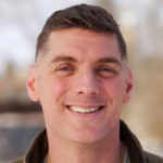 Mike Thurow poses for a portrait.