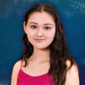 A portrait of Cordelia Momo Fredrickson in a formal dress.