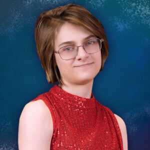 A portrait of Lorenz Fradkin Annen in a formal top.